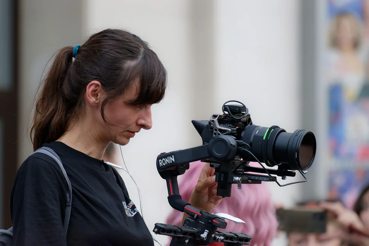 woman, reporter, photographer, cameraman, people, tripod, stabilize, backpack, job, professional, event, pride