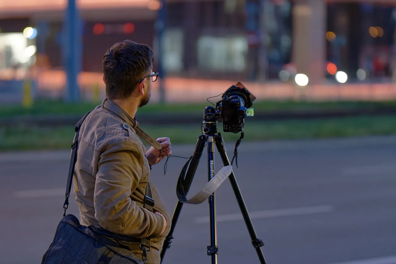 staff, man, young, boy, casual, bag, photographing, evening, street, buildings, cityscape, urban, tripodi, dslr, low light
