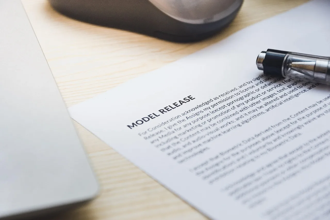 paper, model release, form, document, signing, pen, desk, agreement, business, contract, signature